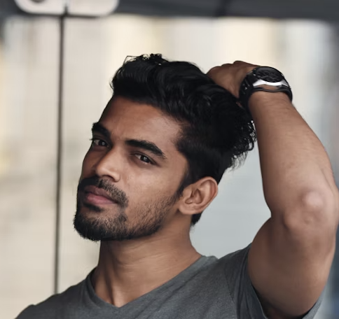 Man fixing hair portrait